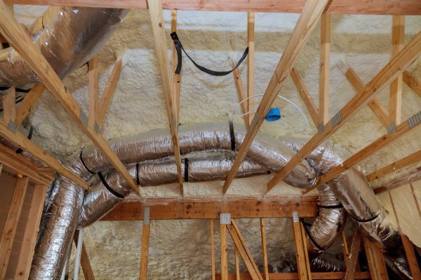 Insulation of attic with fiberglass cold barrier and insulation material insulation attic heating and cooling in winter haven, fl