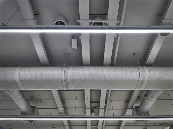 Low Angle View of Air Conditioning Ducts and Piping with Illumination in Dundee FL