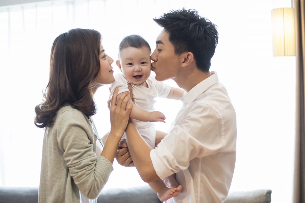 Happy young Chinese family